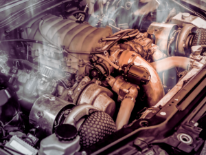 Closeup of semi truck engine overheating 